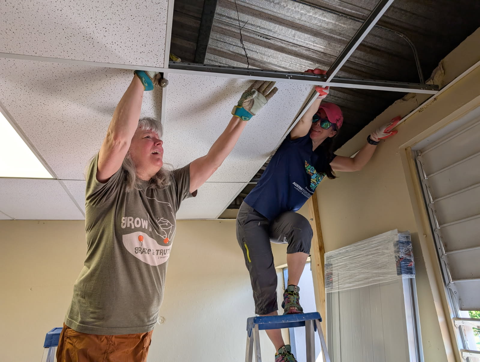 Val Williamson and Tess Doornink were the dream team when it came to installing new ceiling tiles and lights..