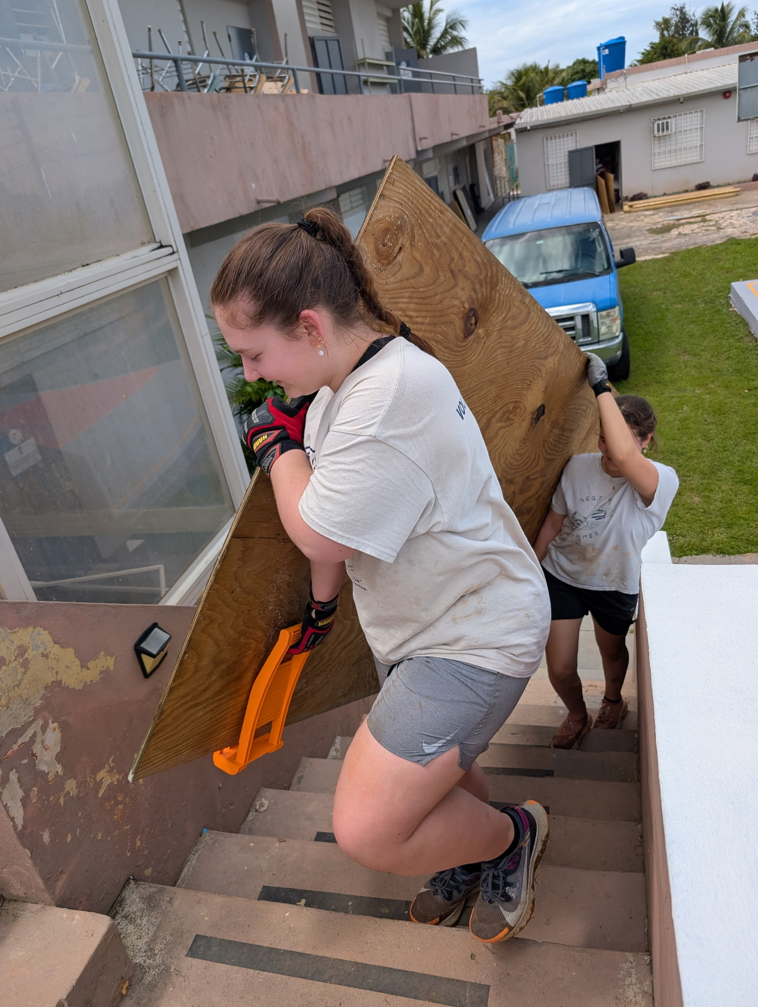When you have to bring 40 sheets of plywood up two flights of stairs, it's all  hands on deck.