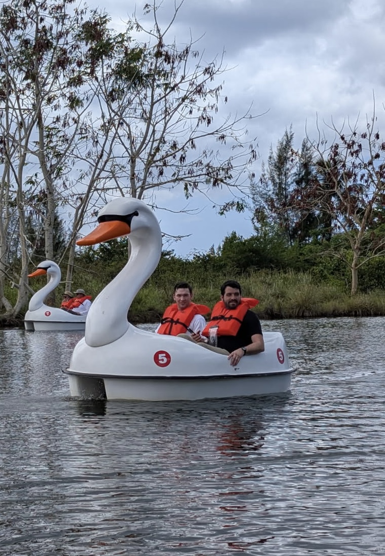 Just a little father-son-swan bonding time for Michael & Elijah Dekker.