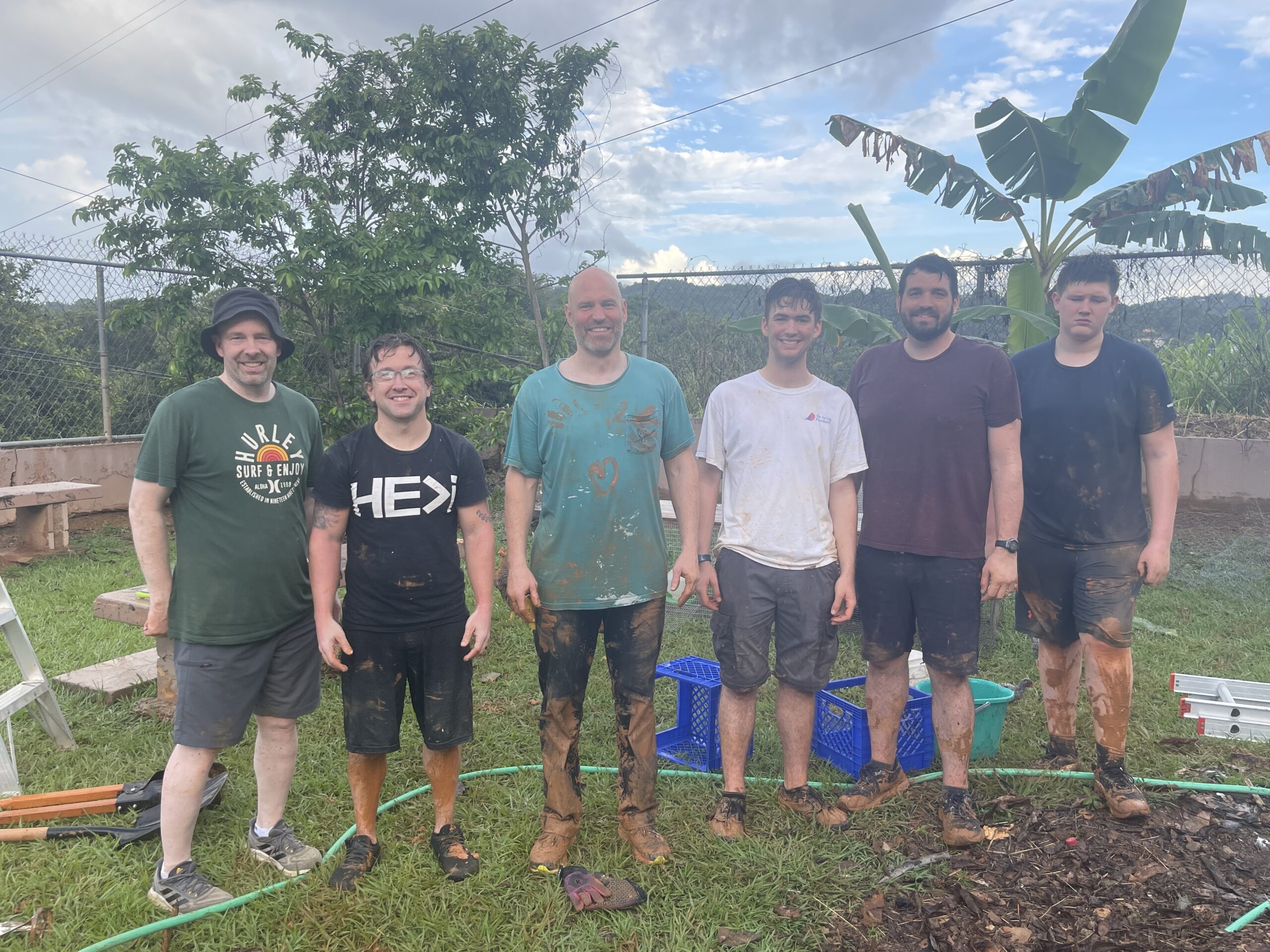 The amazing chicken coop team braved the intermittent downpours to work to the end...and then promptly disposed of their muddy clothes.
