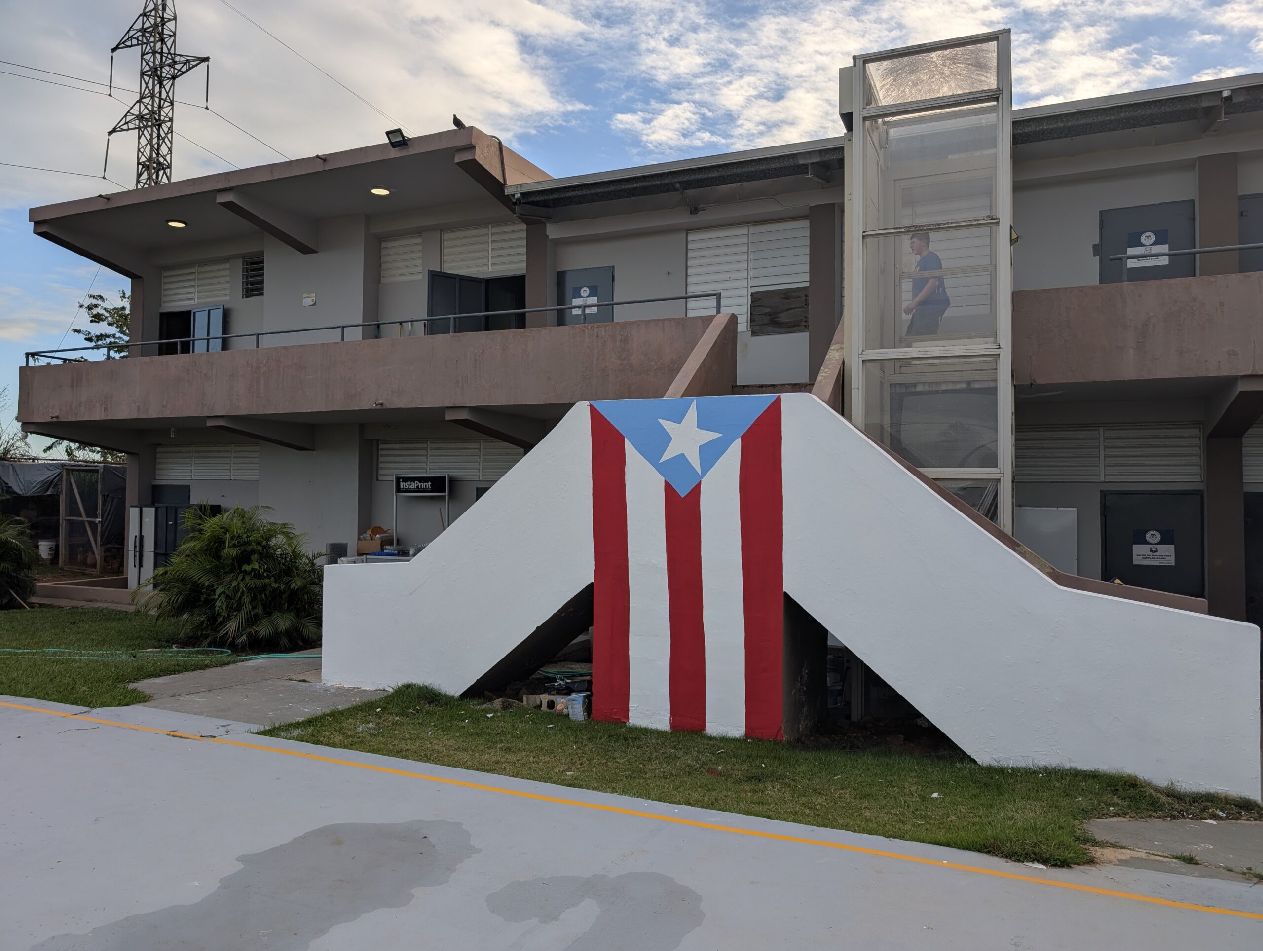 The Puerto Rican flag is a popular sight on buildings and signs. This is the front of the main Somos Gente building.